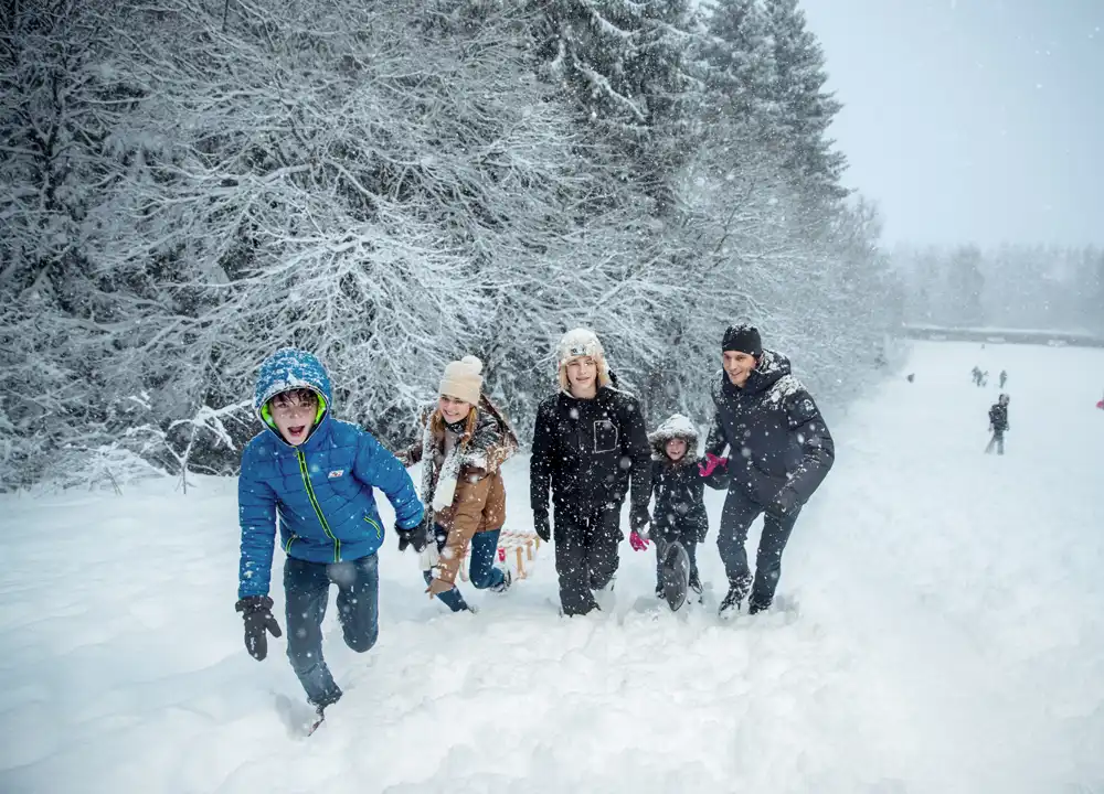Sneeuwpret met de familie in de Ardennen.